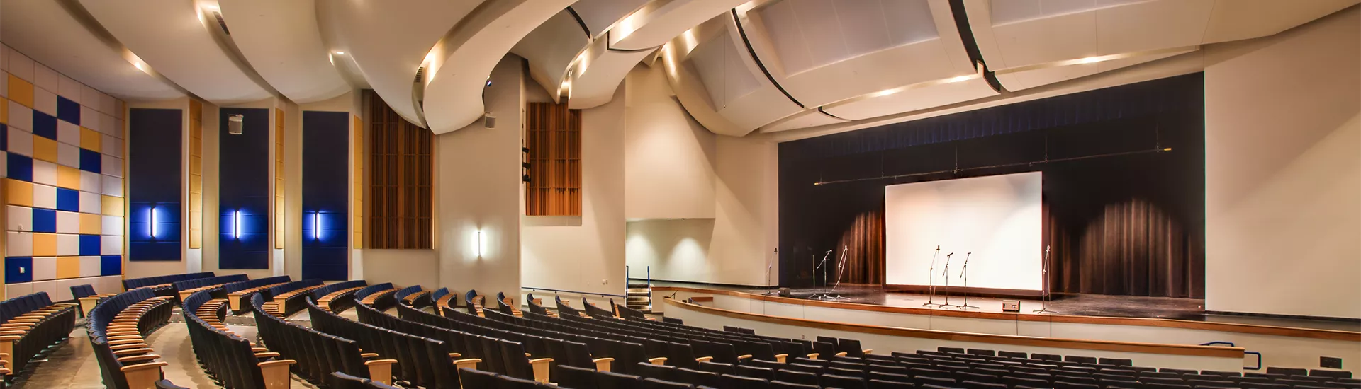 Lace & Grommet projection screen flown in the auditorium of Frisco High School, Frisco, TX.