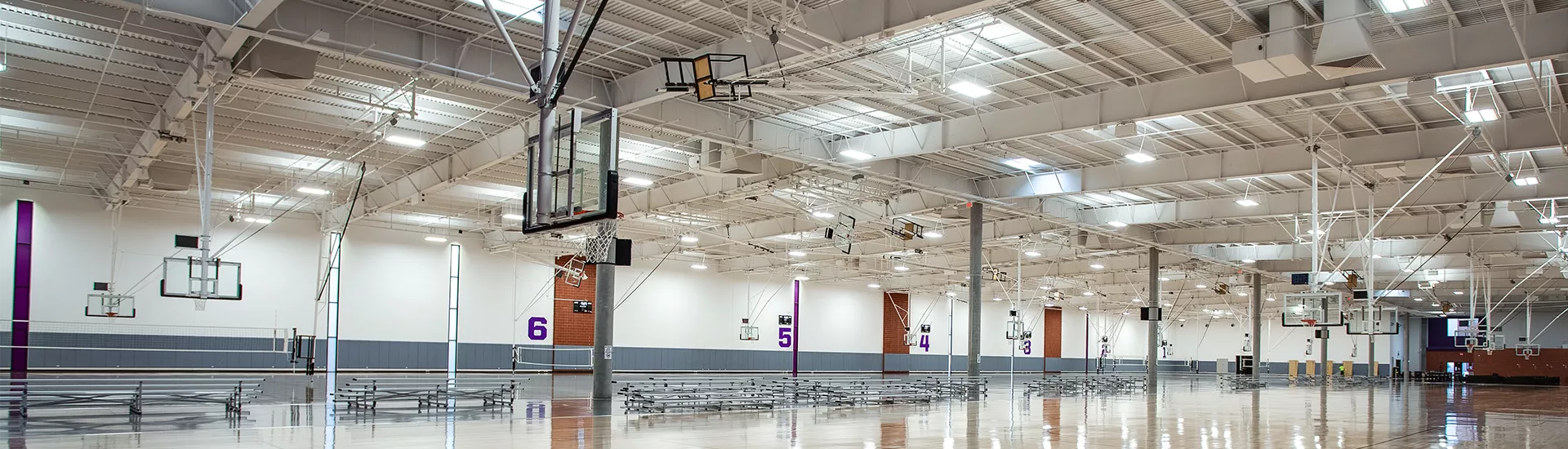Basketball Backstops, Overhead Volleyball Systems, Wall Pads, and Smart Gym control system with WiFi kit for tablet control installed at Grand Canyon University, Phoenix, AZ.